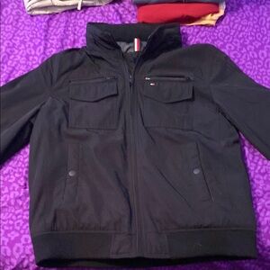 Tommy Hilfiger men’s large jacket with storable hood.